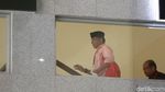 Rizal Djalil Gendong Tas Merah di KPK