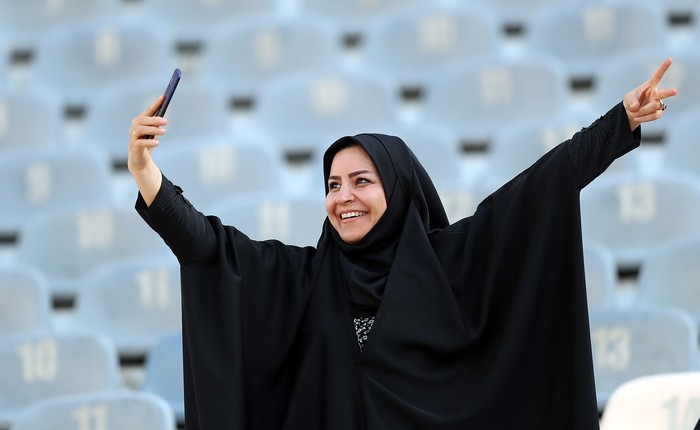TEHRAN, IRAN - OCTOBER 10: Female football fans show their support ahead of the FIFA World Cup Qualifier match between Iran and Cambodia at Azadi Stadium on October 10, 2019 in Tehran, Iran. (Photo by Amin M. Jamali/Getty Images)