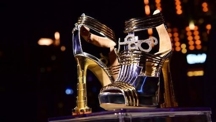 A pair of shoes worth 19.9 million US dollars are seen during the launch presentation at the Dubai Marina on October 11, 2019 in Dubai. - The Moon Star Shoes, of Italian designer Antonio Vietri features 30 carats of diamonds and a small piece of a meteorite discovered in Argentina in 1576. (Photo by GIUSEPPE CACACE / AFP)