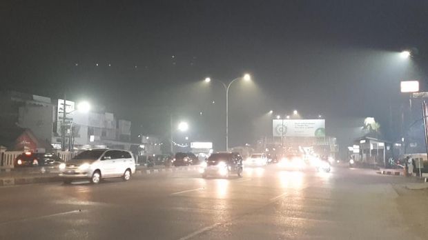 Kabut asap di Palembang.