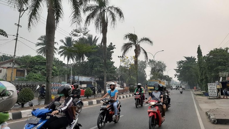 Kabut Asap Tipis Masih Selimuti Palembang dan Sekitarnya Kabut Asap Tipis Masih Selimuti Palembang dan Sekitarnya