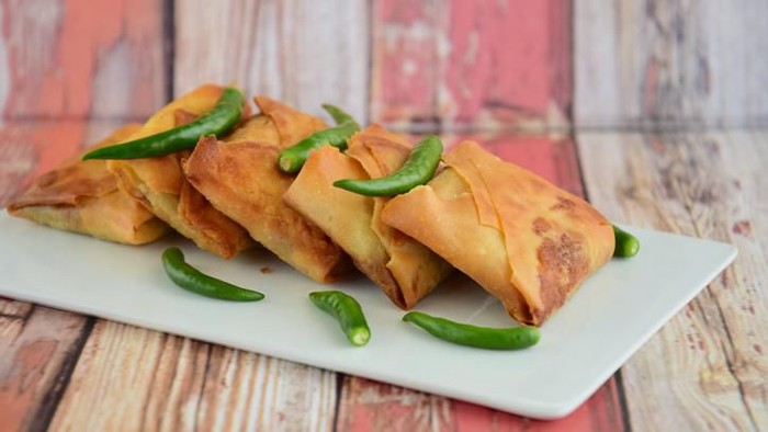making spring rolls, commercial kitchen