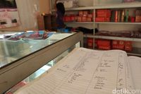 Jangan lupa registrasi dan bayar uang retribusi sejumlah Rp 10 ribu (Randy/detikcom)