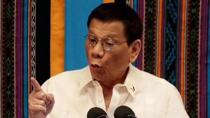 FILE PHOTO: Philippine President Rodrigo Duterte gestures during his fourth State of the Nation Address at the Philippine Congress in Quezon City, Metro Manila, Philippines July 22, 2019. REUTERS/Eloisa Lopez/File Photo