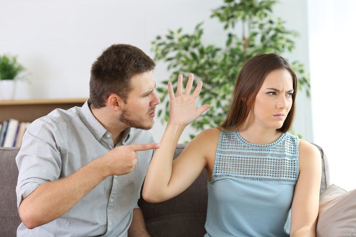 zodiak One loving boyfriend trying to comfort girlfriend embracing her