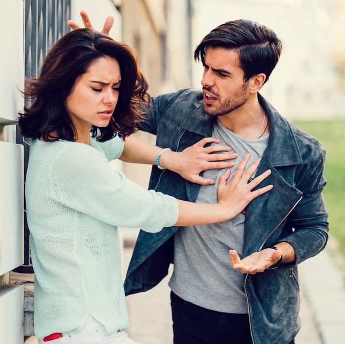 Annoyed boyfriend arguing with his girlfriend