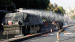 Ibu Kota Chile Rusuh, Bus-bus Dibakar dan Stasiun Kereta Dirusak