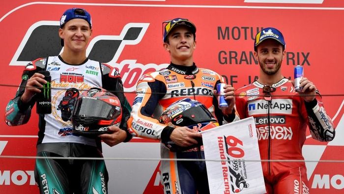 Marc Marquez semakin jauh meninggalkan rival-rivalnya di klasemen MotoGP usai menang di MotoGP Jepang (Foto: Toshifumi KITAMURA / AFP)