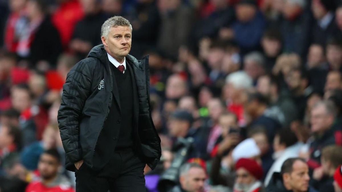 Formasi tiga bek yang dikembangkan Ole Gunnar Solskjaer mampu meredam Liverpool (Foto: Catherine Ivill/Getty Images)