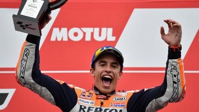 JUDI ONLINE Marc Marquez juara di MotoGP Jepang. (Foto: Toshifumi KITAMURA / AFP)