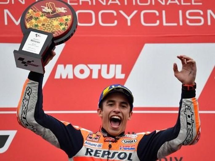 Pebalap Repsol Honda, Marc Marquez, menjadi rider pertama yang tembus 400 poin dalam satu musim MotoGP. (Foto: Toshifumi Kitamura/AFP) Pebalap Repsol Honda, Marc Marquez, menjadi rider pertama yang tembus 400 poin dalam satu musim MotoGP. (Foto: Toshifumi Kitamura/AFP)