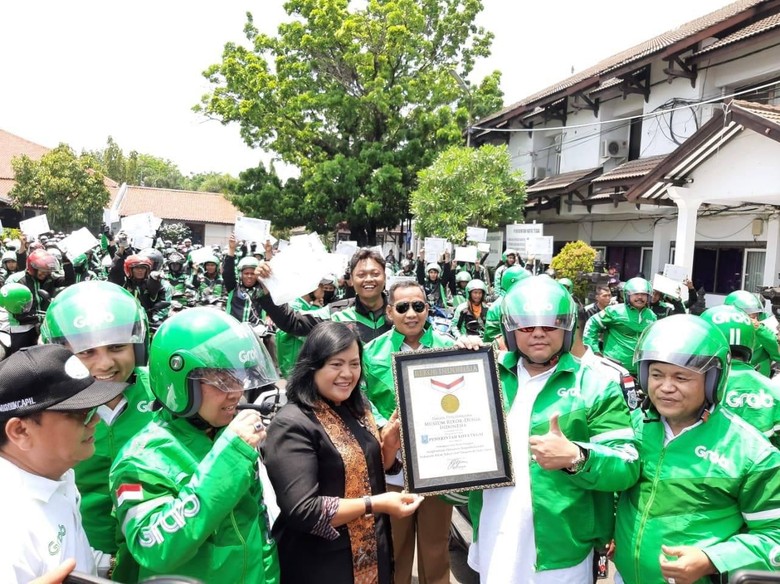 Rekor! Pemkot Tegal Kirim Dokumen Terbanyak Pakai GrabExpress ke Warga Rekor! Pemkot Tegal Kirim Dokumen Terbanyak Pakai GrabExpress ke Warga