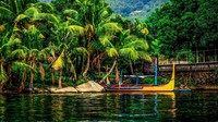 Selain indah alamnya, traveler juga bisa berkeliling danau dan melakukan berbagai olahraga air yang ditawarkan oleh sejumlah pengelola jasa lokal. (iStock)