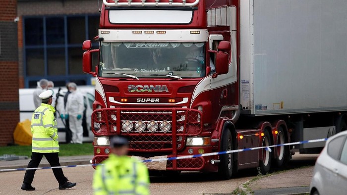 Police move the lorry container where bodies were discovered, in Grays, Essex, Britain October 23, 2019.  REUTERS/Peter Nicholls