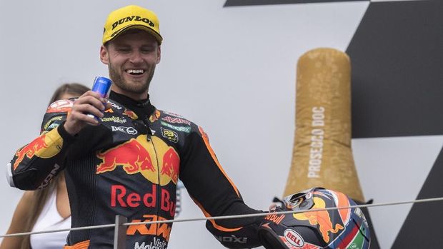 SPIELBERG, AUSTRIA - AUGUST 11:  Brad Binder of South Africa and Red Bull KTM  Ajo celebrates the victory at the end of the Moto2 race on the podium during the MotoGp of Austria - Race at Red Bull Ring on August 11, 2019 in Spielberg, Austria. (Photo by Mirco Lazzari gp/Getty Images)