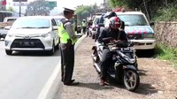Polisi memang tengah menggelar razia di daerah Persimpangan Cikidang atau Pos Elang di jalur Cibadak.
