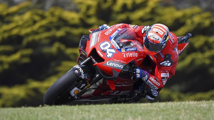 Ducati rider Andrea Dovizioso of Italy enters a turn during free practice at the Australian Motorcycle Grand Prix at Phillip Island near Melbourne, Australia, Saturday, Oct. 26, 2019. (AP Photo/Andy Brownbill)