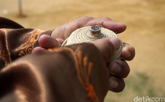 Mengenal Gasing  Permainan Tradisional Warga Natuna Foto 4