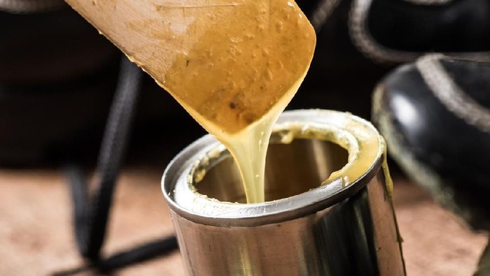 closeup rubber adhesive on wooden desk