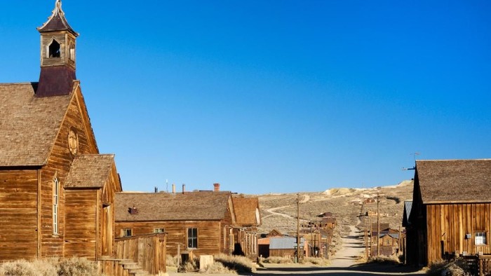 Interior view of one of the abandoned houses in the ghost town of Bodie in northern California.  Photo captured using an iPhone and processed with Snapseed.