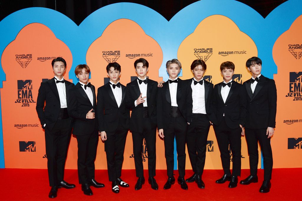 SEVILLE, SPAIN - NOVEMBER 03: (L-R) Johnny, Haechan, Mark, Jaehyun, Taeyong, Yuta, Taeil, and Doyoung of NCT 127 attend the MTV EMAs 2019 at FIBES Conference and Exhibition Centre on November 03, 2019 in Seville, Spain. (Photo by Kate Green/Getty Images for MTV)