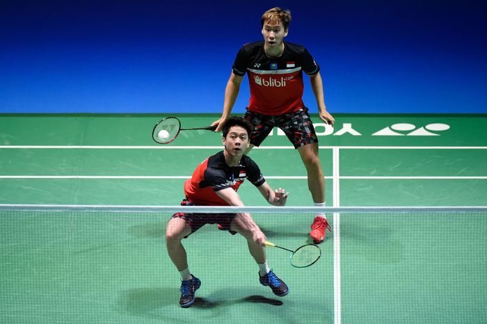 Kevin Sanjaya Sukamuljo/Marcus Fernaldi Gideon CHOFU, JAPAN - JULY 28: Marcus Fernaldi Gideon and Kevin Sanjaya Sukamuljo of Indonesia compete in the Mens Doubles Final match against Mohammad Ahsan and Hendra Setiawan of Indonesia on day six of the Daihatsu Yonex Japan Open Badminton Championships, Tokyo 2020 Olympic Games test event at Musashino Forest Sport Plaza on July 28, 2019 in Chofu, Tokyo, Japan. (Photo by Matt Roberts/Getty Images)