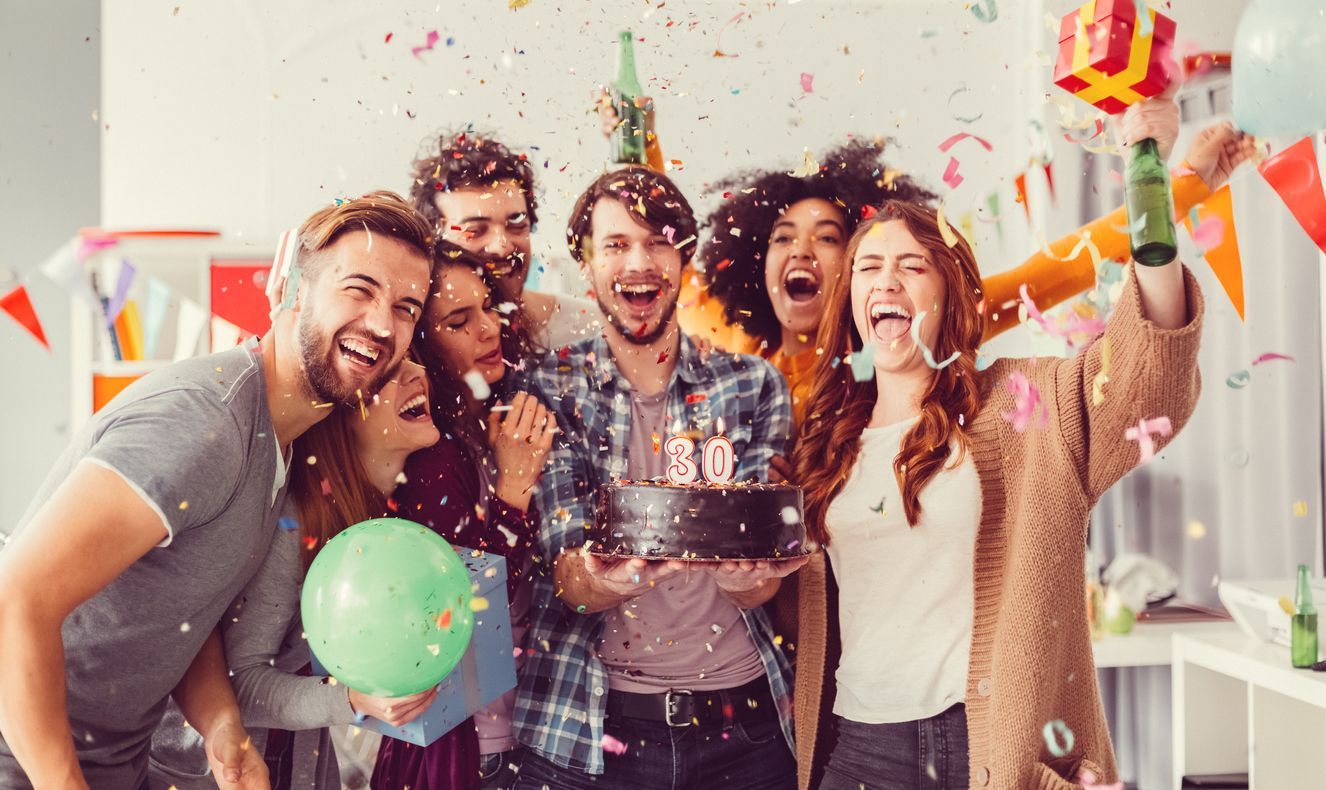 Group of friends at office birthday party