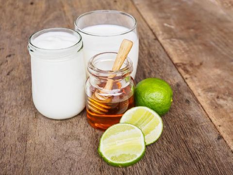 Natural detox set yogurt milk lemon and honey on wooden background