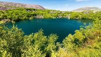 Dibuka tahun 1829, tambang Dorothea Slate Quarry di Wales beroperasi hingga tahun 1970. Kini bekas tambang tersebut telah bertransformasi menjadi danau sekaligus tempat wisata. (iStock)