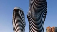 Absolute World. Dua bangunan tinggi yang melengkung seksi ini menjadi sesuatu yang menggairahkan di pinggiran kota terbesar di Toronto. Kedua pencakar langit dengan ketinggian 50 dan 56 lantai tersebut adalah rancangan arsitek asal China, Yansong Ma. Istimewa/Dok. architecturaldigest.