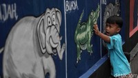 Beragam jenis hewan juga jadi tema mural.