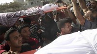 Israel kembali melancarkan serangan udara ke wilayah Jalur Gaza pada Rabu (13/11) waktu setempat. Serangan udara terbaru itu dilaporkan menewaskan sedikitnya 8 warga Palestina di Gaza. AP Photo/Adel Hana.