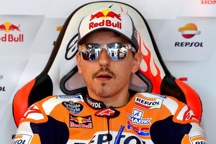 Repsol Honda Teams Spanish rider Jorge Lorenzo looks on in the box ahead of the third MotoGP free practice session of the Moto Grand Prix of Aragon at the Motorland circuit in Alcaniz on September 21, 2019. (Photo by JOSE JORDAN / AFP)