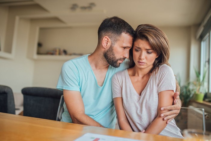 zodiak Upset couple ignoring each other at kitchen, relationship difficulties, quarrel