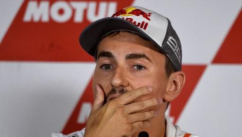 Jorge Lorenzo Three-time MotoGP champion and Repsol Honda MotoGP rider Jorge Lorenzo holds a press conference where he announces his retirement, ahead of the Valencia Grand Prix, at the Ricardo Tormo racetrack, in Cheste near Valencia, on November 14, 2019. (Photo by JOSE JORDAN / AFP)