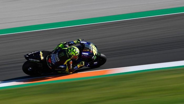 Valentino Rossi mengakui sulit untuk comeback dari posisi start ke-12 di balapan MotoGP Valencia. (Foto: Pierre-Philippe Marcou / AFP) Valentino Rossi mengakui sulit untuk comeback dari posisi start ke-12 di balapan MotoGP Valencia. (Foto: Pierre-Philippe Marcou / AFP)