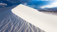 White Sands menjadi bagian dari Bandelier National Monument, salah satu taman nasional di AS yang berada di Negara Bagian New Mexico. Tepatnya, berlokasi sekitar 26 km dari Kota Alamogordo. (iStock)