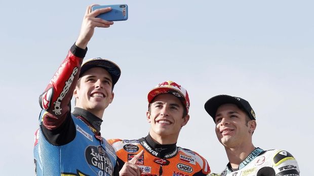 Marc Marquez dan Alex Marquez meraih juara dunia MotoGP dan Moto2 2019. (