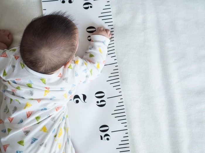 concept of baby growth, height, development