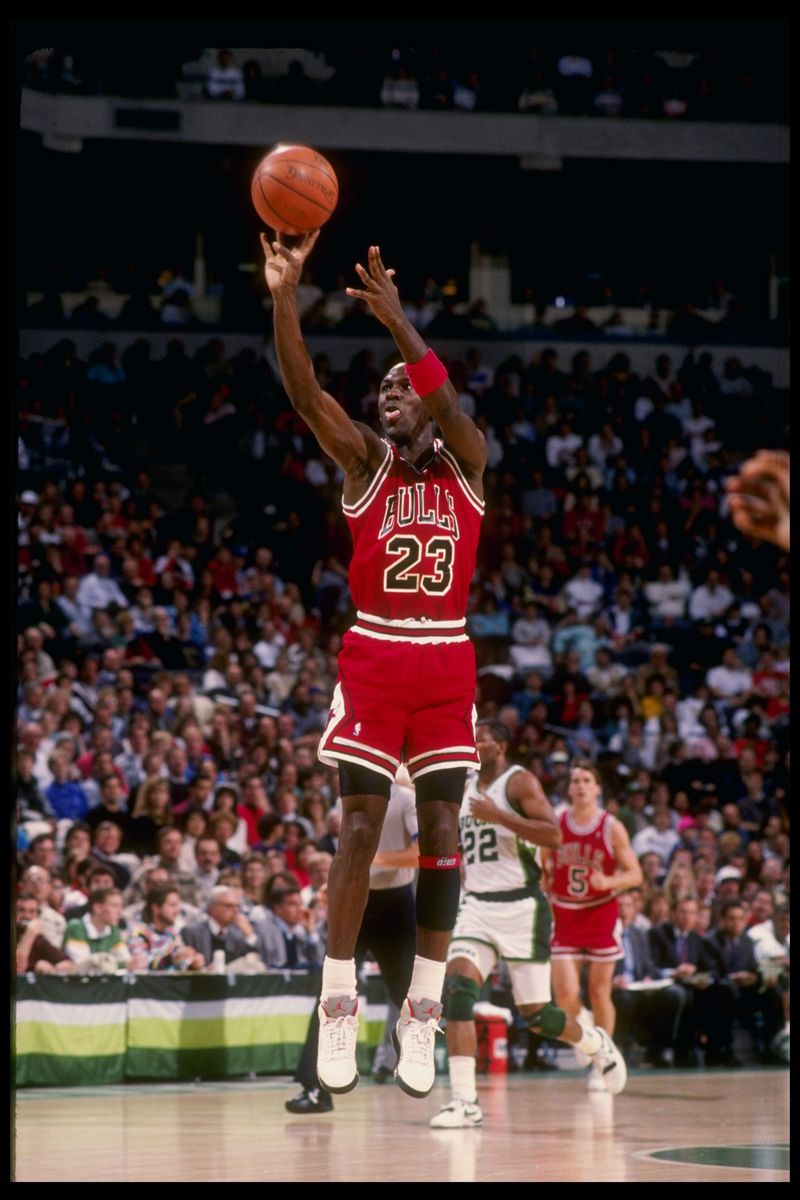 Michael Jordan Guard Michael Jordan of the Chicago Bulls in action during a game against the Milwaukee Bucks at the Bradley Center in Milwaukee, Wisconsin.