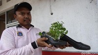Tak hanya sepatu boots, sepatu wanita yang tak terpakai juga disulap menjadi pot.