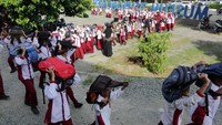 Sekitar 1.600 pelajar dari jenjang SD hingga SMA di Aceh mengikuti kompetisi simulasi evakuasi mandiri bencana gempa dan tsunami di Museum tsunami, Banda Aceh, Aceh, Jumat (29/11/2019).