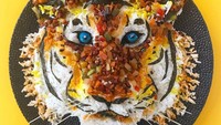 Harimau ini dibuat dari nasi dengan potongan kecil sayuran serta daging. Sangat mirip dengan harimau yang seram itu. Foto: Instagram @demealprepper