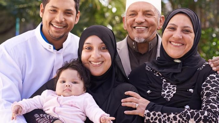 A muslim family enjoying a day outside