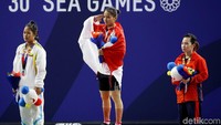 Sementara di angkatan clean and jerk, mojang Bandung itu sempat gagal di angkatan pertama 100 kg, kemudian mampu memperbaiki angkatan kedua dan ketiga sekaligus mempertajam rekor remaja Asia atas namanya sendiri di clean and jerk 104 kg. Sebelumnya, angkatan terbaik clean and jerk Windy ada di angka 102 kg.