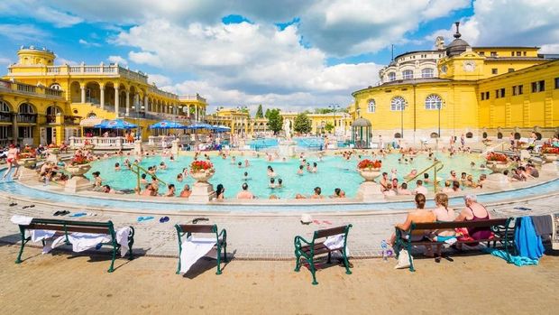 Budapest, Hungary - June 20, 2014: People soaking in one of the pools in Lukacs Thermal Baths in Budapest, Hungary.