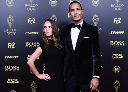 Liverpool's Dutch defender Virgil van Dijk and his wife Rike Nooitgedagt (L) arrive to attend the Ballon d'Or France Football 2019 ceremony at the Chatelet Theatre in Paris on December 2, 2019. (Photo by Anne-Christine POUJOULAT / AFP)