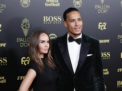 Saat Van Dijk pindah dari Groningen ke Celtic, Rike Nooitgedagt ikut pergi meninggalkan Belanda. (AP Photo/Francois Mori)