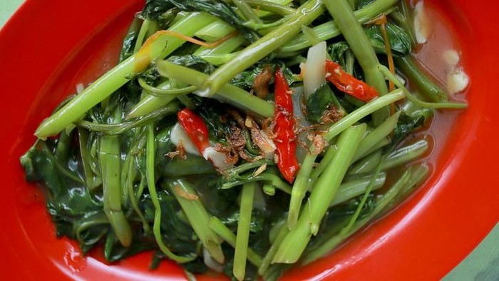 Delicious Cah Kangkung, Delicious stir fried water spinach or kale. Indonesian food