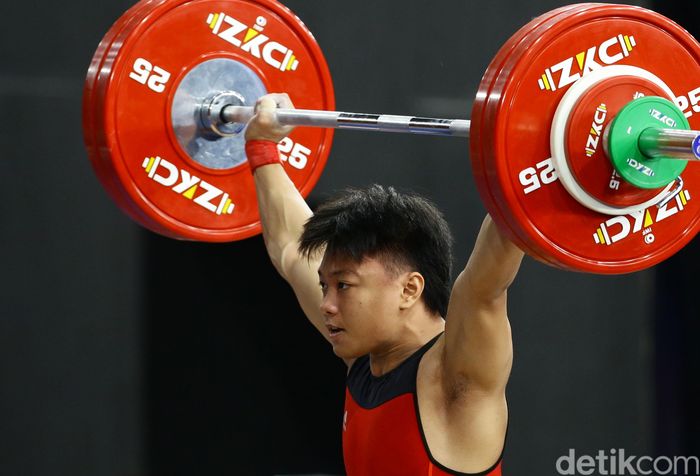 Atlet angkat besi, Rahmat Erwin Abdullah, menambah koleksi medali emas Indonesia di SEA Games 2019 Filipina. Dia menjadi yang terbaik di kelas 73 kg putra.